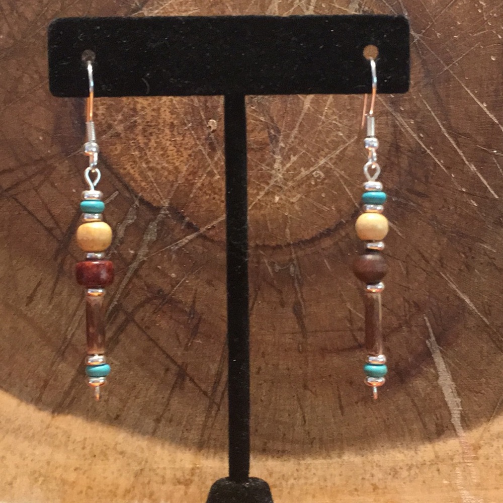 Long dangly earrings made w wood and coconut beads
